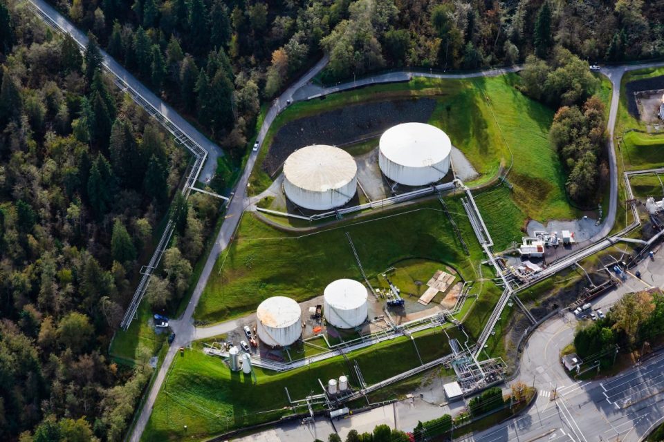 Aerial view of spherical storage tanks in forest